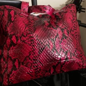 Maroon snake bag